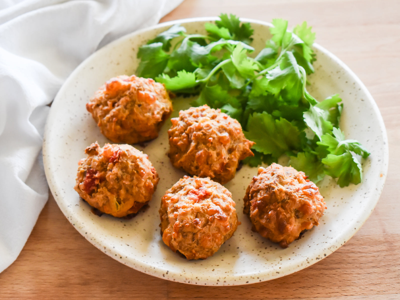 https://www.chugwaterchili.com/cdn/shop/files/Cream_Cheese_Sausage_Balls_1600x.jpg?v=1675369201